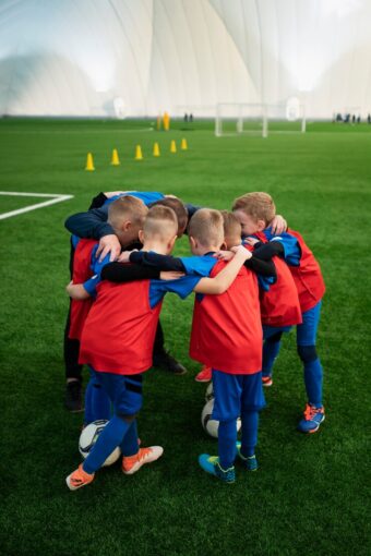 full-shot-kids-gathering-field_23-2149270930-e1739963457191